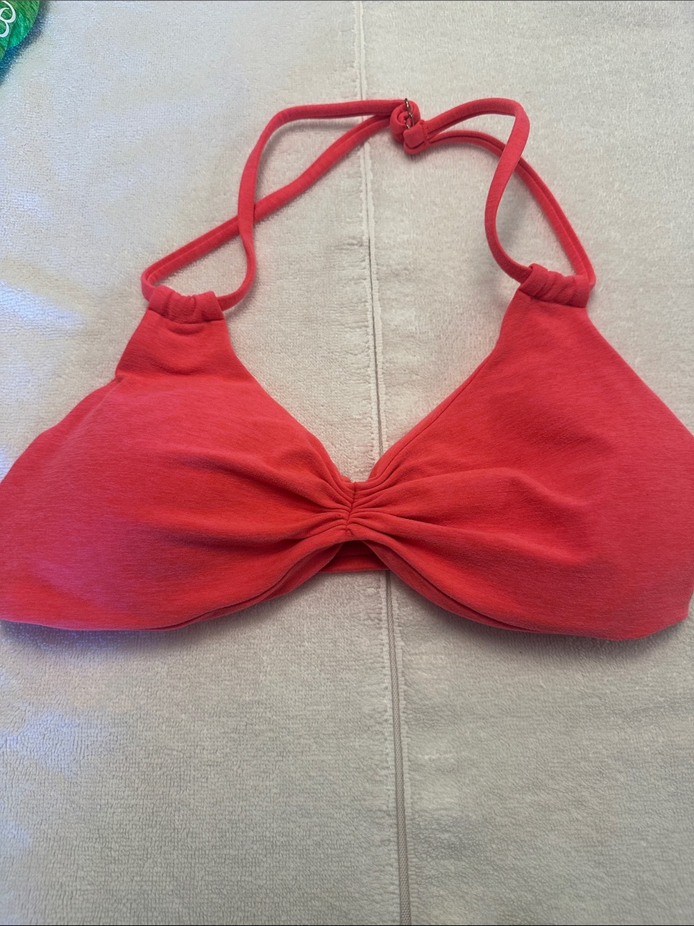 Bombshell Sportswear  neon apricot Halter backless bra in neon apricot
